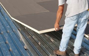 benefits of insulating East Horsley flat roofing